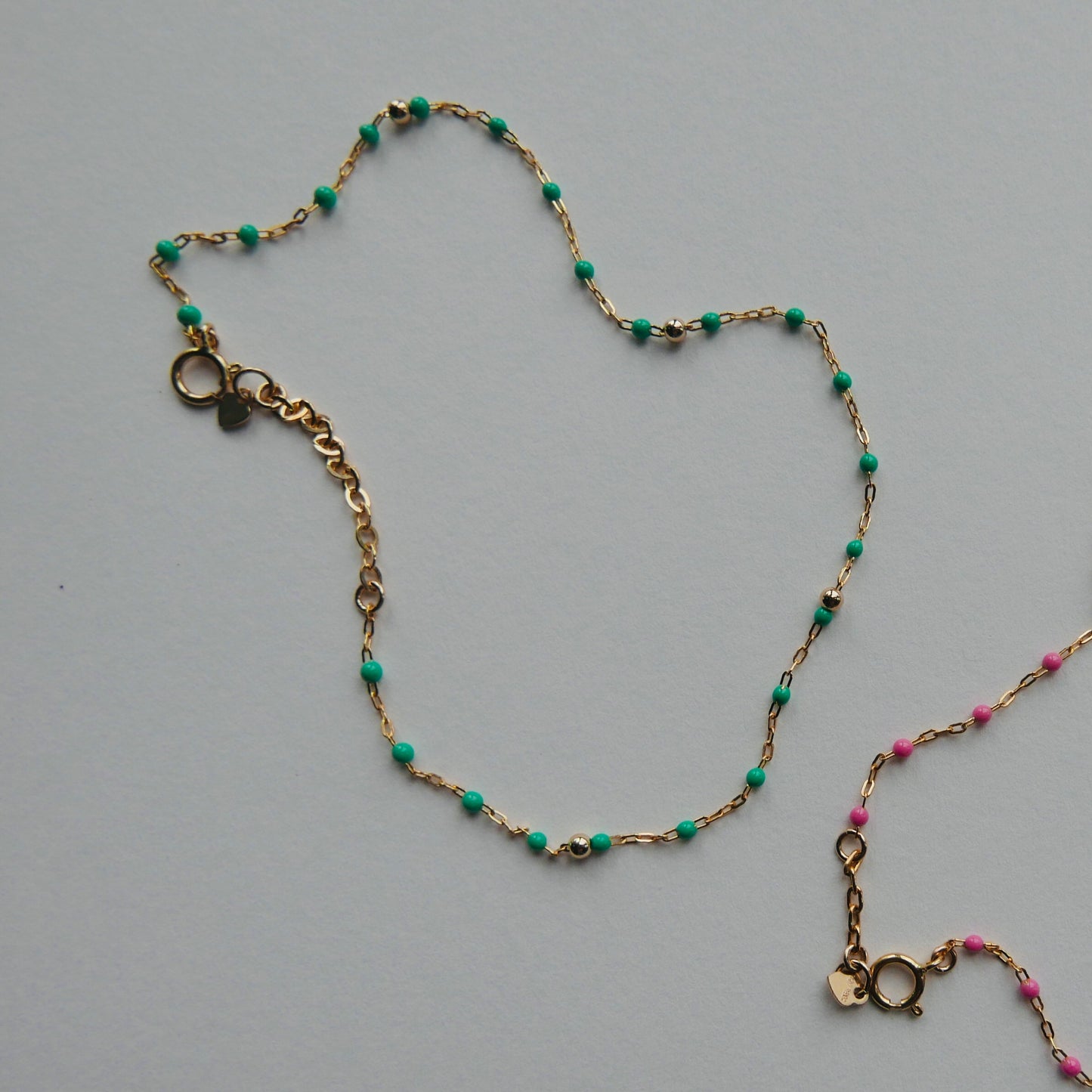 Enameled anklet with heart charm and solid gold beads