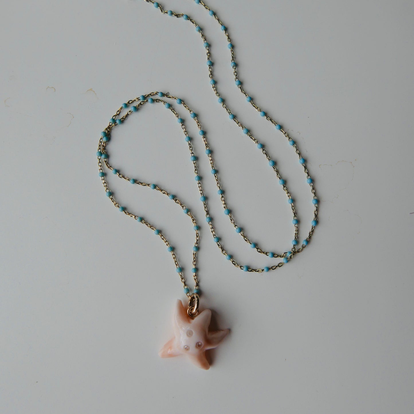 Starfish  Necklace, coral & diamonds