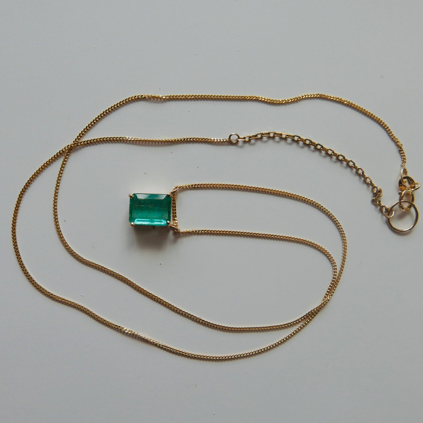 Emerald necklace with curb chain