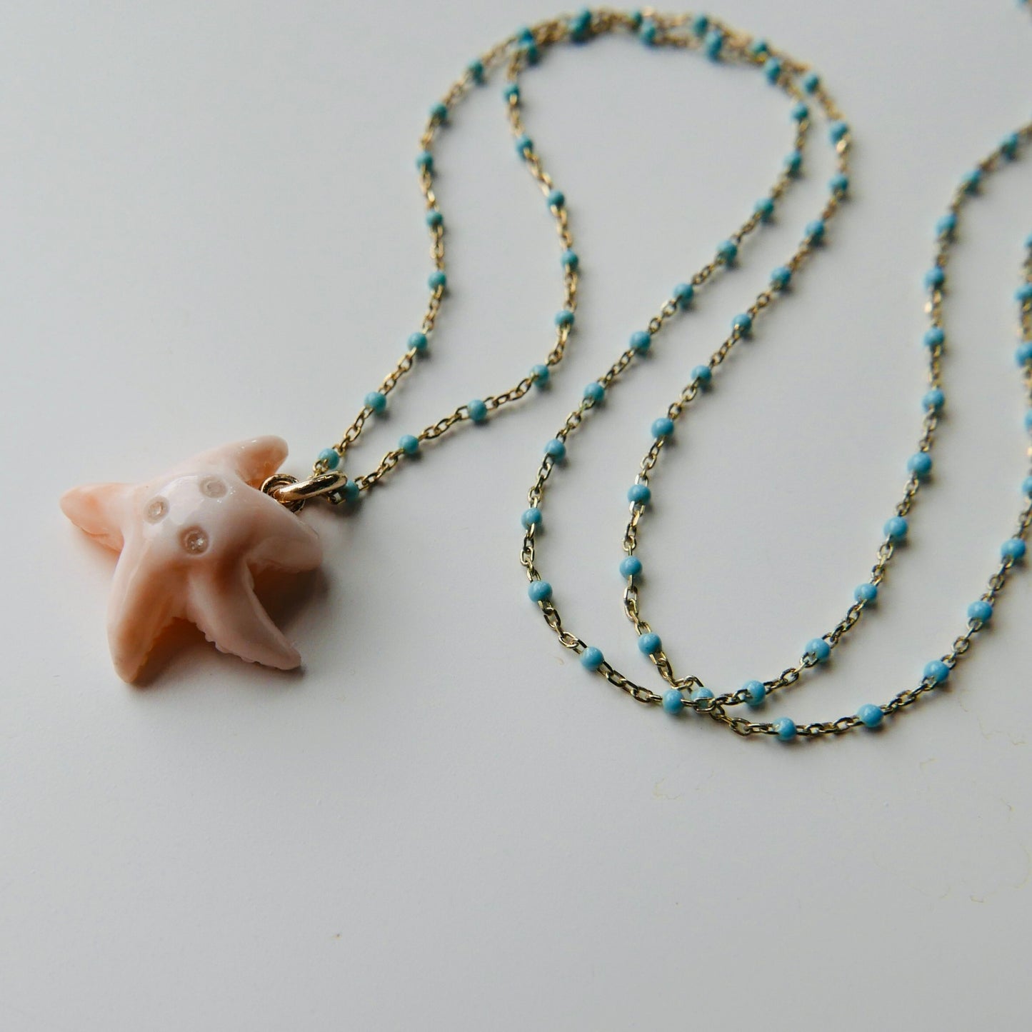 Starfish  Necklace, coral & diamonds