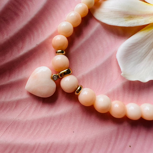 Graduated coral LOVE bracelet