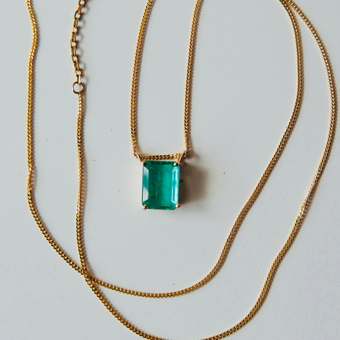 Emerald necklace with curb chain