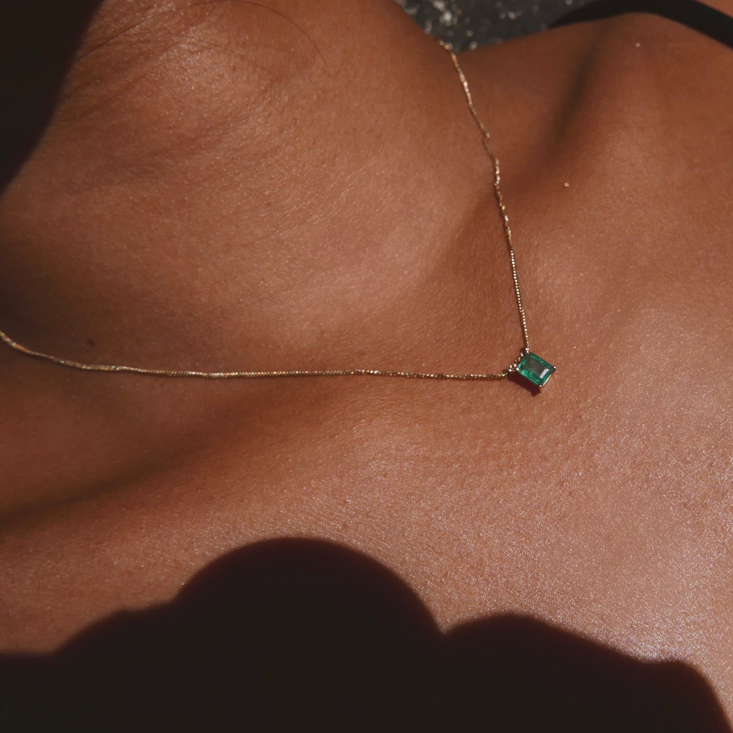 Emerald necklace with curb chain